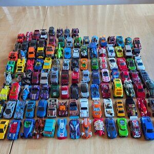A Collection of 113 "Hot Wheels" Cars & Trucks (225)